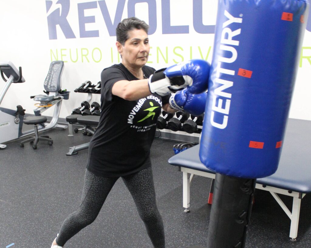 Client boxing with a Neuro Exercise Specialist