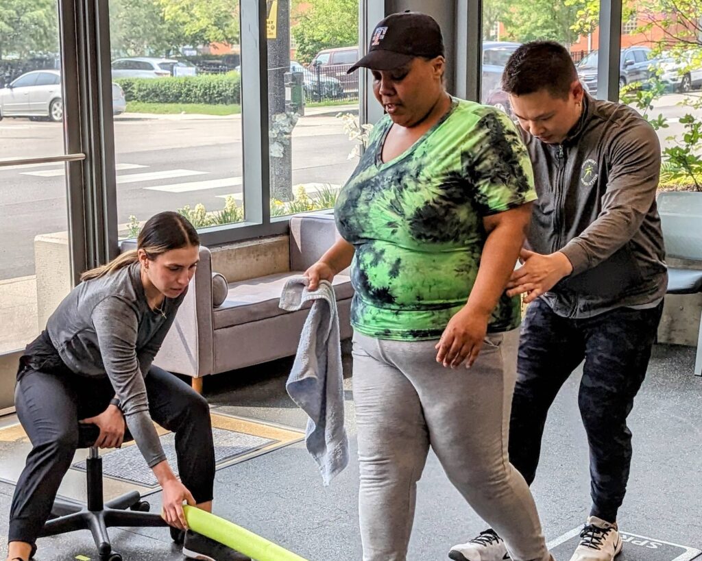 Client exercising with a Neuro Exercise Specialist